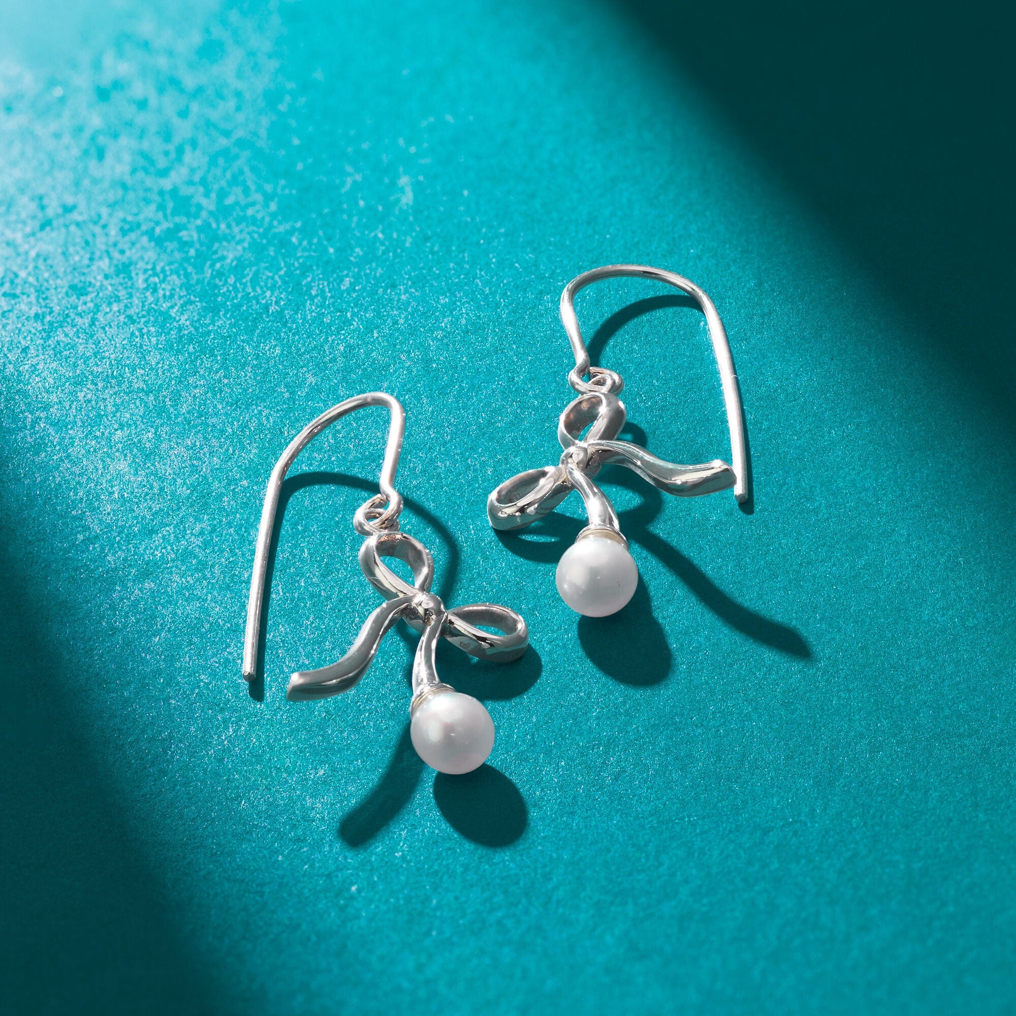 Boma Jewelry Ribbon with a Pearl Earrings