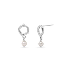 Boma Jewelry Silver earrings with pearl drops on a white background
