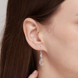 Serene Spiral Dangle Earrings with Stone