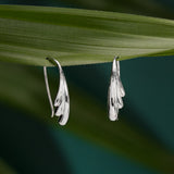Layered Fluid Pull Through Hoops