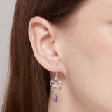 Outline Daisy Dangles with Lavender CZ