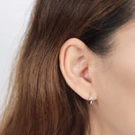 Boma Jewelry Earrings Huggie Hoops with Triangle Gemstones